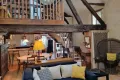 l'Écurie, overzicht huiskamer, eetkamer, keuken en mezzanine