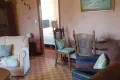 Woonkamer Cerises met slaapkamer beneden