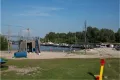 strand en zwemwater op het park de Kuilart